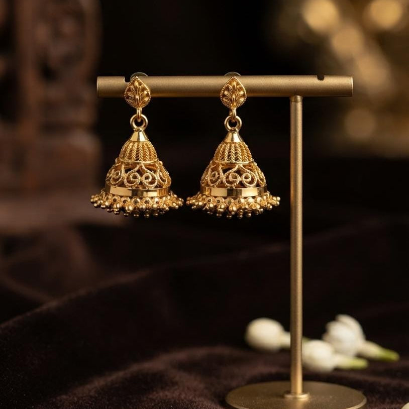 Ornate Gold Jhumka Earrings with Pearl Drops