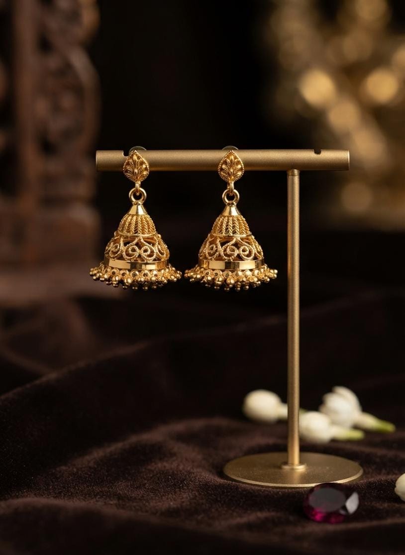 Ornate Gold Jhumka Earrings with Pearl Drops